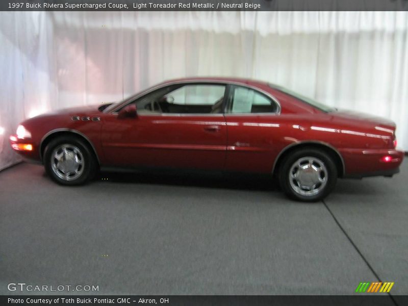 Light Toreador Red Metallic / Neutral Beige 1997 Buick Riviera Supercharged Coupe