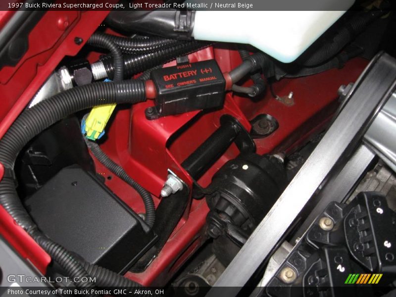 Light Toreador Red Metallic / Neutral Beige 1997 Buick Riviera Supercharged Coupe