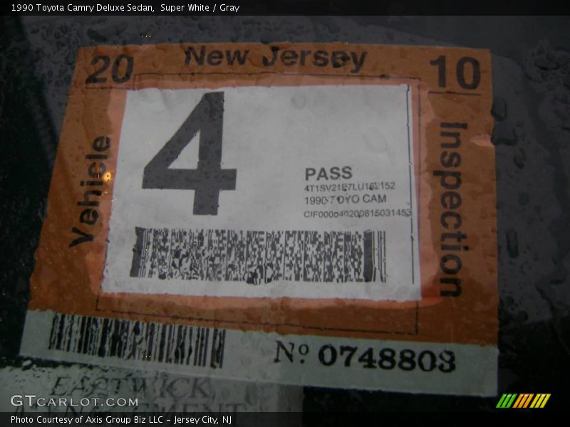 Super White / Gray 1990 Toyota Camry Deluxe Sedan