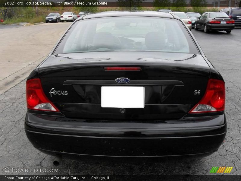 Pitch Black / Medium Graphite 2002 Ford Focus SE Sedan