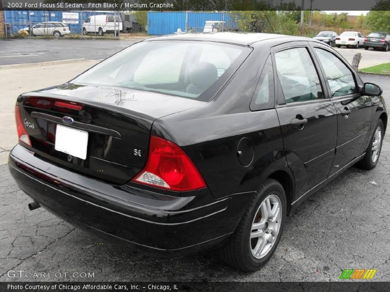 Pitch Black / Medium Graphite 2002 Ford Focus SE Sedan
