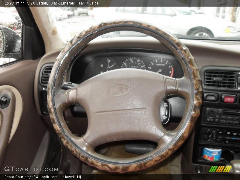 Black Emerald Pearl / Beige 1993 Infiniti G 20 Sedan