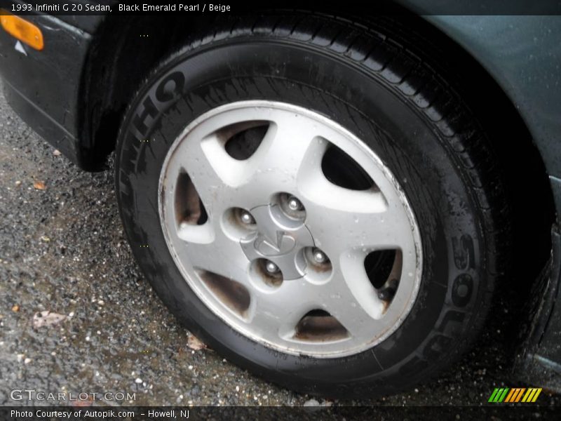 Black Emerald Pearl / Beige 1993 Infiniti G 20 Sedan