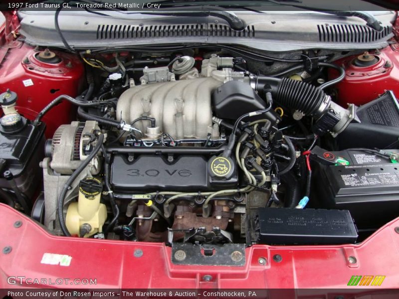 Toreador Red Metallic / Grey 1997 Ford Taurus GL