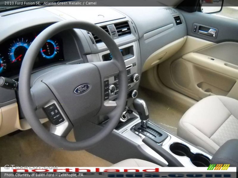 Atlantis Green Metallic / Camel 2010 Ford Fusion SE