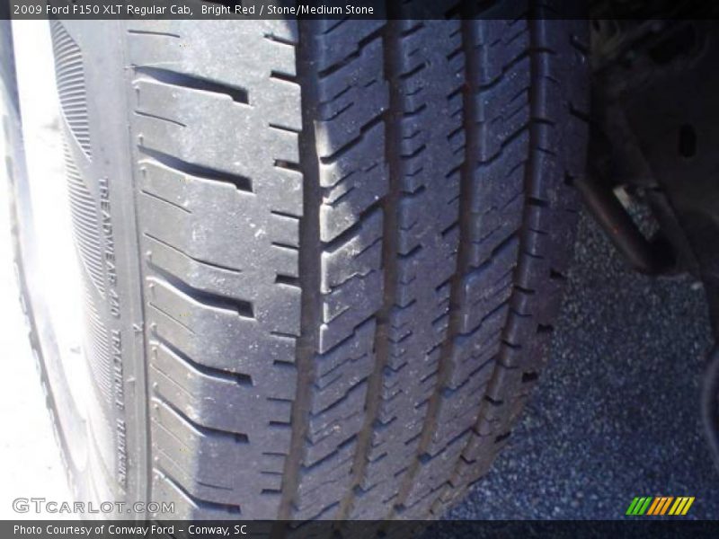 Bright Red / Stone/Medium Stone 2009 Ford F150 XLT Regular Cab