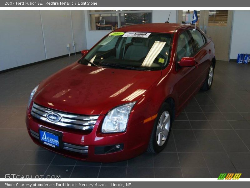 Redfire Metallic / Light Stone 2007 Ford Fusion SE