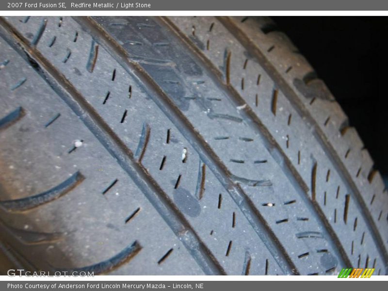 Redfire Metallic / Light Stone 2007 Ford Fusion SE