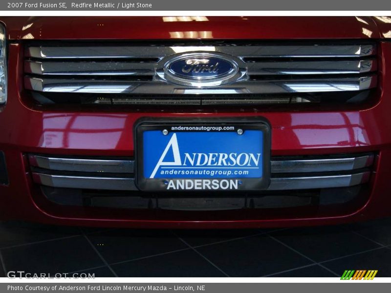 Redfire Metallic / Light Stone 2007 Ford Fusion SE