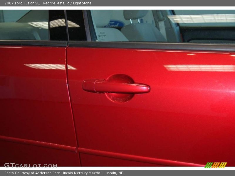 Redfire Metallic / Light Stone 2007 Ford Fusion SE