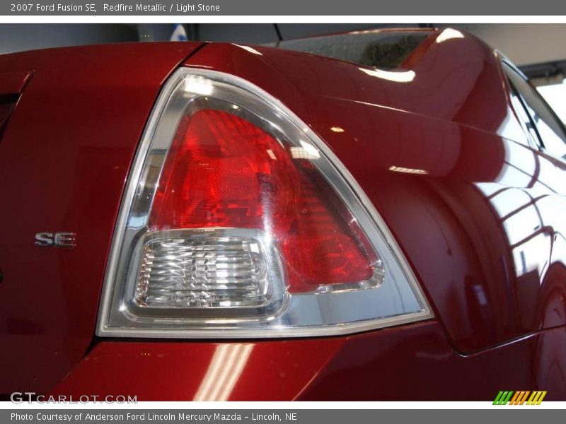 Redfire Metallic / Light Stone 2007 Ford Fusion SE