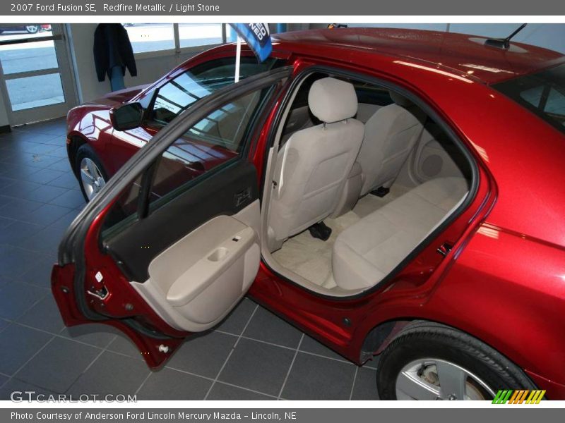 Redfire Metallic / Light Stone 2007 Ford Fusion SE