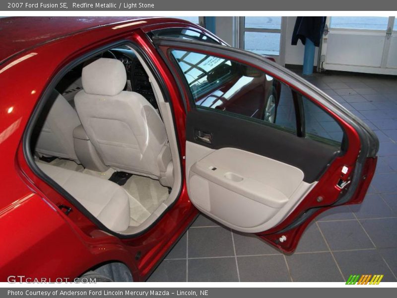 Redfire Metallic / Light Stone 2007 Ford Fusion SE