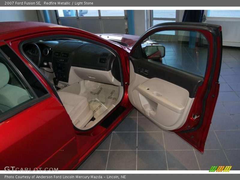 Redfire Metallic / Light Stone 2007 Ford Fusion SE