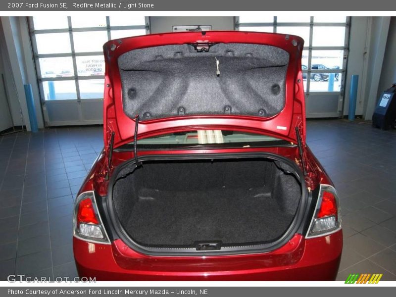 Redfire Metallic / Light Stone 2007 Ford Fusion SE