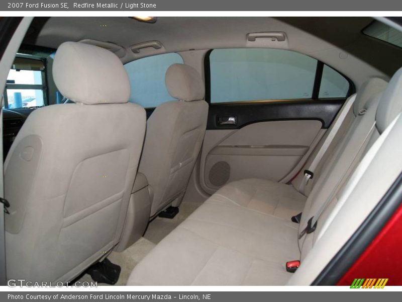 Redfire Metallic / Light Stone 2007 Ford Fusion SE