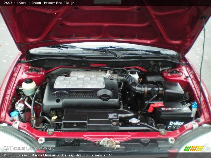 Pepper Red / Beige 2003 Kia Spectra Sedan