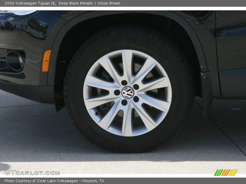 Deep Black Metallic / Urban Brown 2009 Volkswagen Tiguan SE