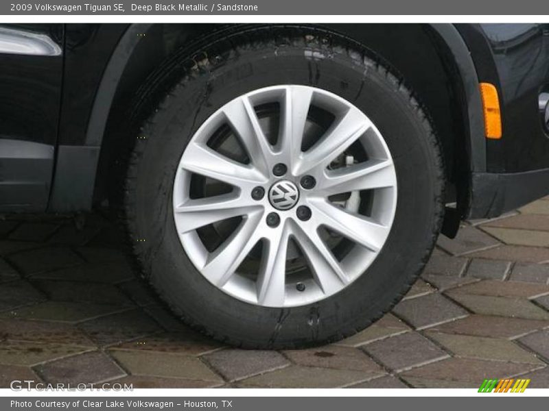 Deep Black Metallic / Sandstone 2009 Volkswagen Tiguan SE