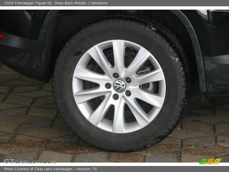 Deep Black Metallic / Sandstone 2009 Volkswagen Tiguan SE