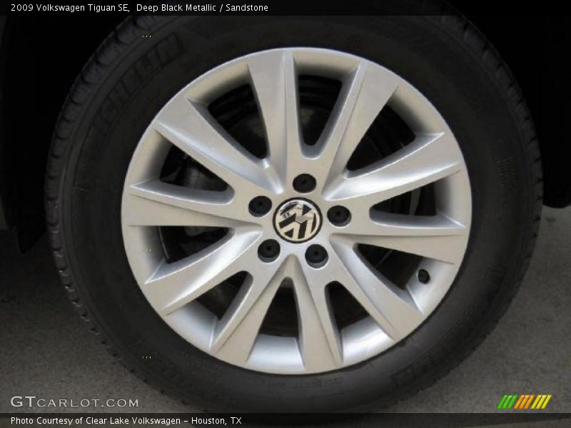 Deep Black Metallic / Sandstone 2009 Volkswagen Tiguan SE