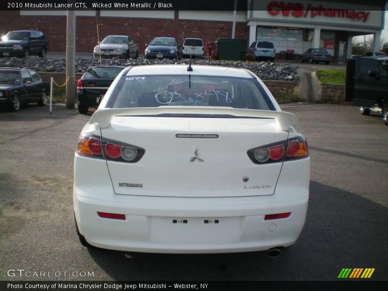 Wicked White Metallic / Black 2010 Mitsubishi Lancer GTS