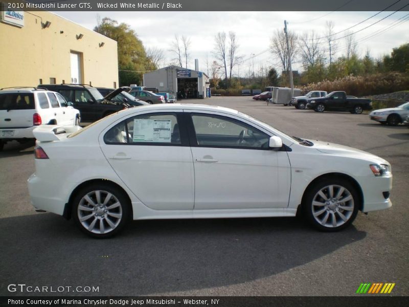 Wicked White Metallic / Black 2010 Mitsubishi Lancer GTS
