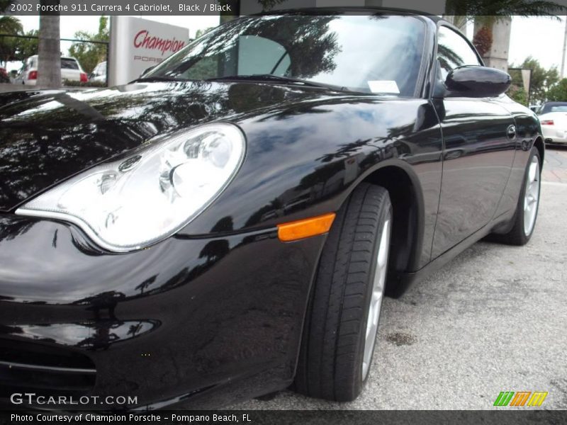 Black / Black 2002 Porsche 911 Carrera 4 Cabriolet