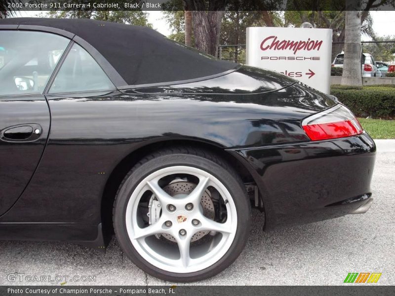 Black / Black 2002 Porsche 911 Carrera 4 Cabriolet