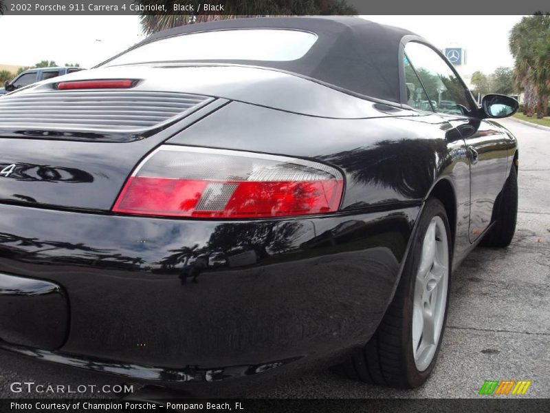 Black / Black 2002 Porsche 911 Carrera 4 Cabriolet