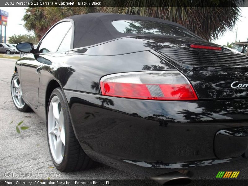 Black / Black 2002 Porsche 911 Carrera 4 Cabriolet