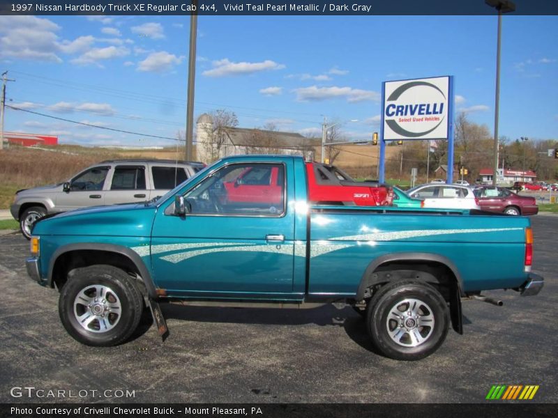 Vivid Teal Pearl Metallic / Dark Gray 1997 Nissan Hardbody Truck XE Regular Cab 4x4