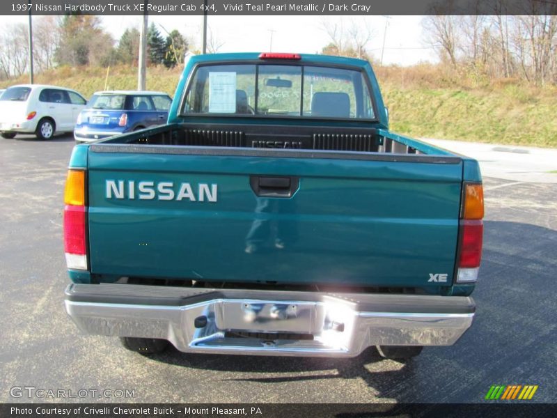 Vivid Teal Pearl Metallic / Dark Gray 1997 Nissan Hardbody Truck XE Regular Cab 4x4