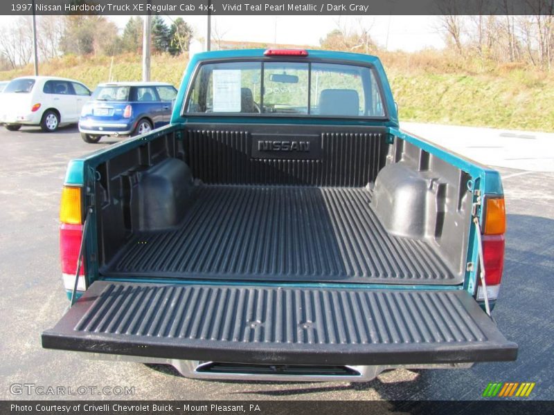 Vivid Teal Pearl Metallic / Dark Gray 1997 Nissan Hardbody Truck XE Regular Cab 4x4
