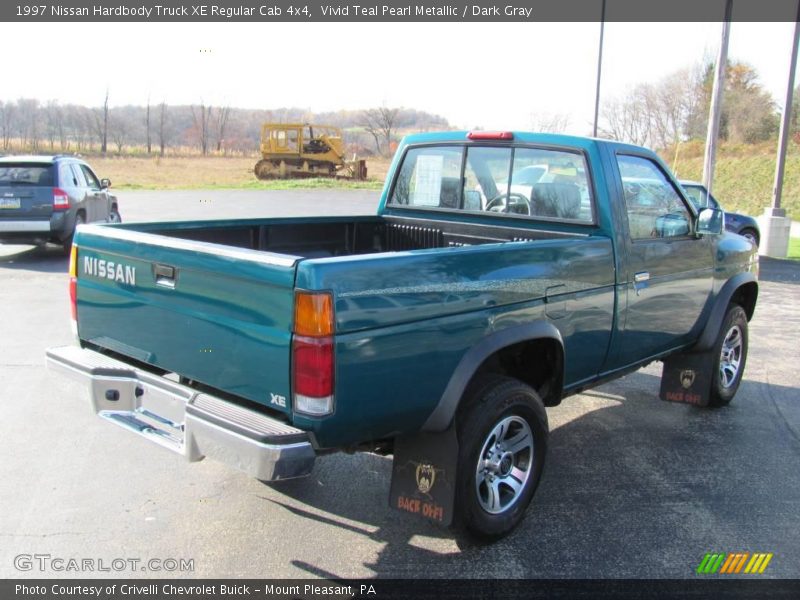 Vivid Teal Pearl Metallic / Dark Gray 1997 Nissan Hardbody Truck XE Regular Cab 4x4