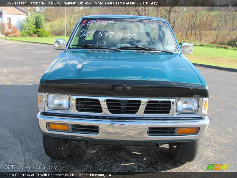Vivid Teal Pearl Metallic / Dark Gray 1997 Nissan Hardbody Truck XE Regular Cab 4x4