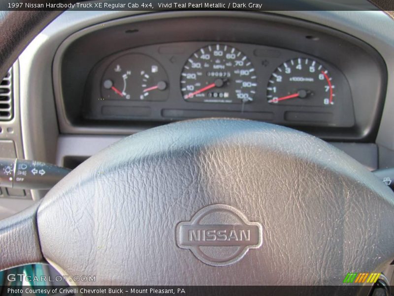 Vivid Teal Pearl Metallic / Dark Gray 1997 Nissan Hardbody Truck XE Regular Cab 4x4