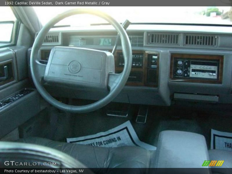 Dark Garnet Red Metallic / Gray 1992 Cadillac DeVille Sedan