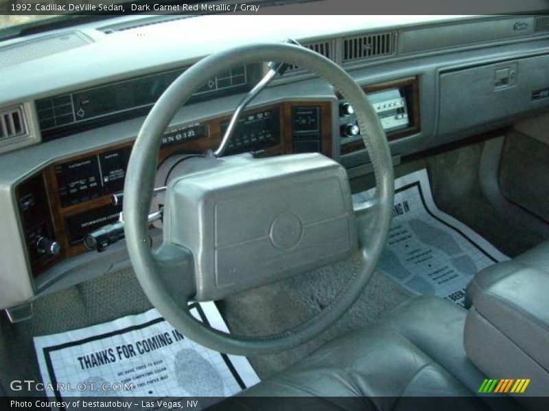 Dark Garnet Red Metallic / Gray 1992 Cadillac DeVille Sedan