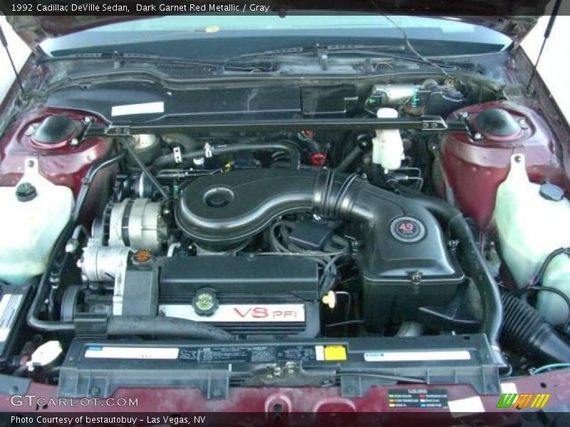 Dark Garnet Red Metallic / Gray 1992 Cadillac DeVille Sedan