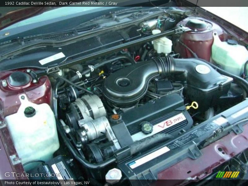 Dark Garnet Red Metallic / Gray 1992 Cadillac DeVille Sedan