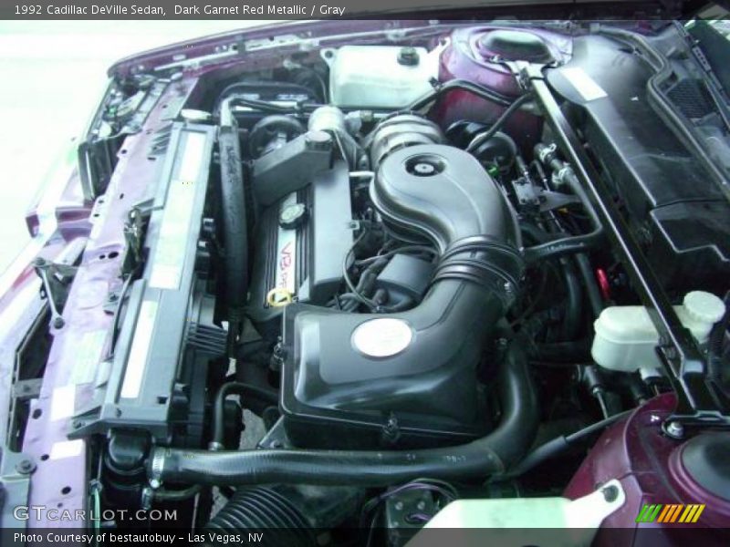 Dark Garnet Red Metallic / Gray 1992 Cadillac DeVille Sedan