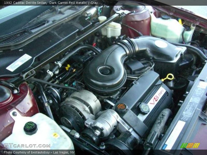 Dark Garnet Red Metallic / Gray 1992 Cadillac DeVille Sedan