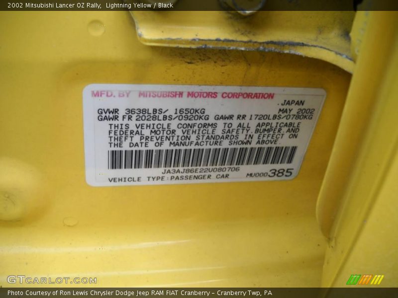Lightning Yellow / Black 2002 Mitsubishi Lancer OZ Rally