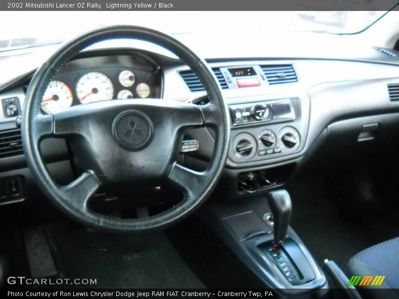Lightning Yellow / Black 2002 Mitsubishi Lancer OZ Rally