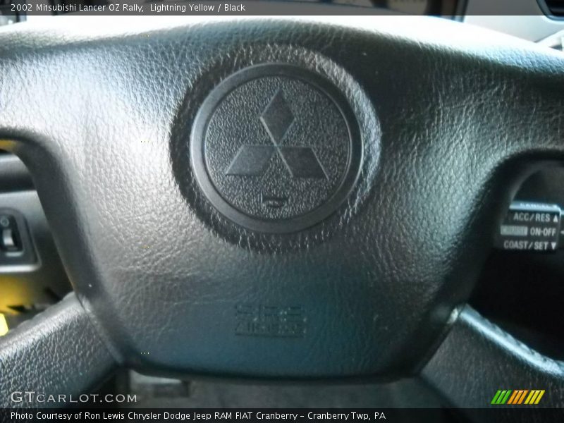 Lightning Yellow / Black 2002 Mitsubishi Lancer OZ Rally