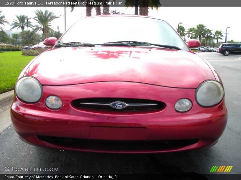 Toreador Red Metallic / Medium Prairie Tan 1998 Ford Taurus LX
