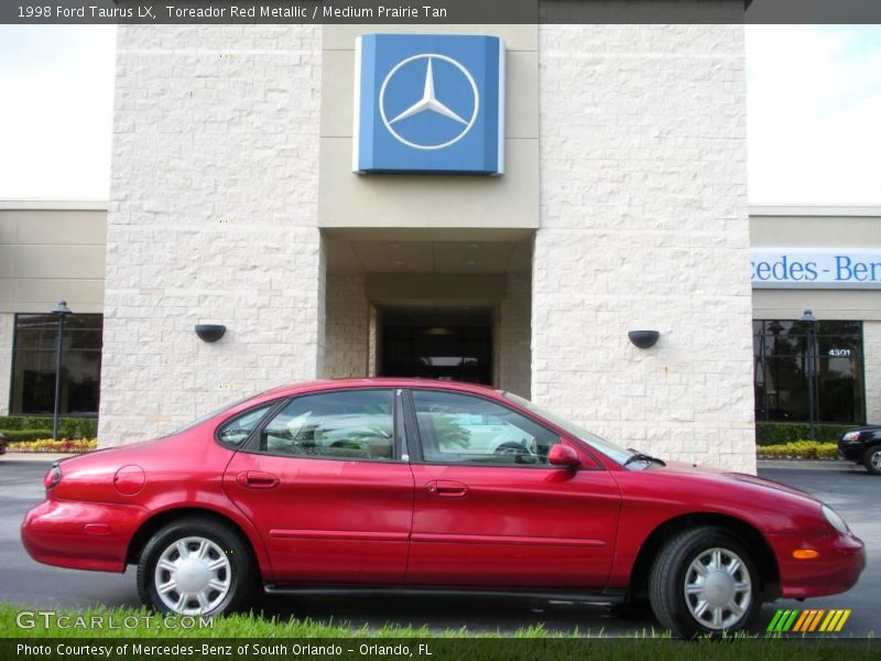 Toreador Red Metallic / Medium Prairie Tan 1998 Ford Taurus LX