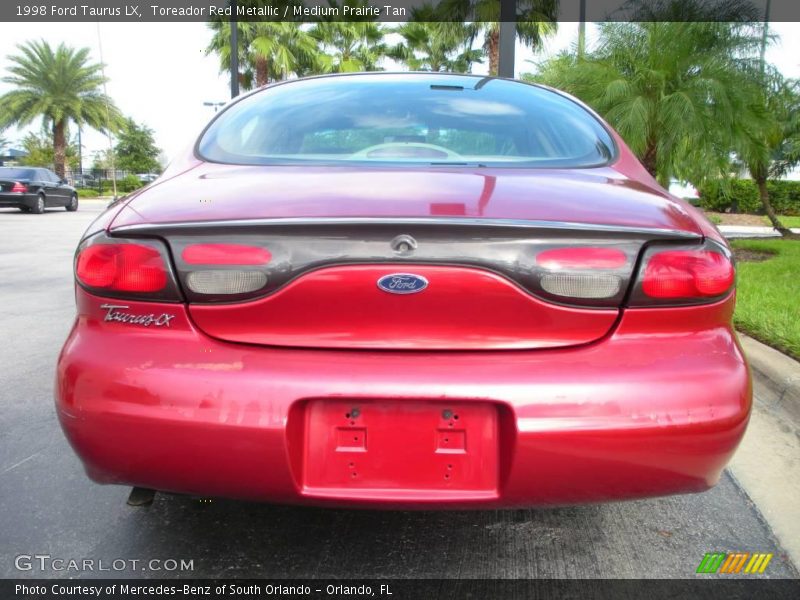 Toreador Red Metallic / Medium Prairie Tan 1998 Ford Taurus LX