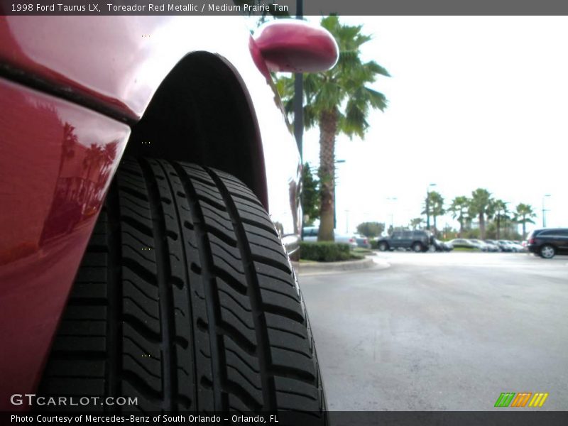 Toreador Red Metallic / Medium Prairie Tan 1998 Ford Taurus LX